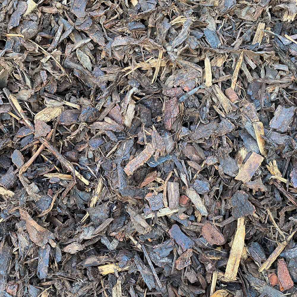A close-up image of Tan Bark mulch, showing the texture and color of the material.