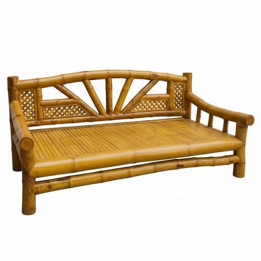 Yellow bamboo sofa against a textured wall.